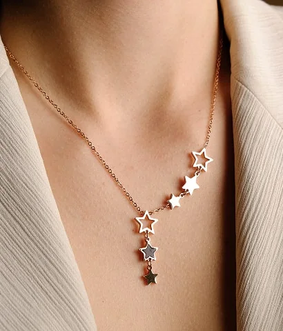 Rose gold star cascade necklace