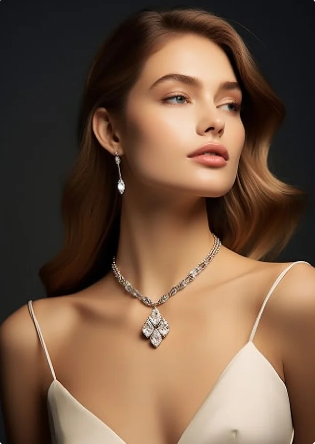 Model wearing a diamond pendant and drop earrings